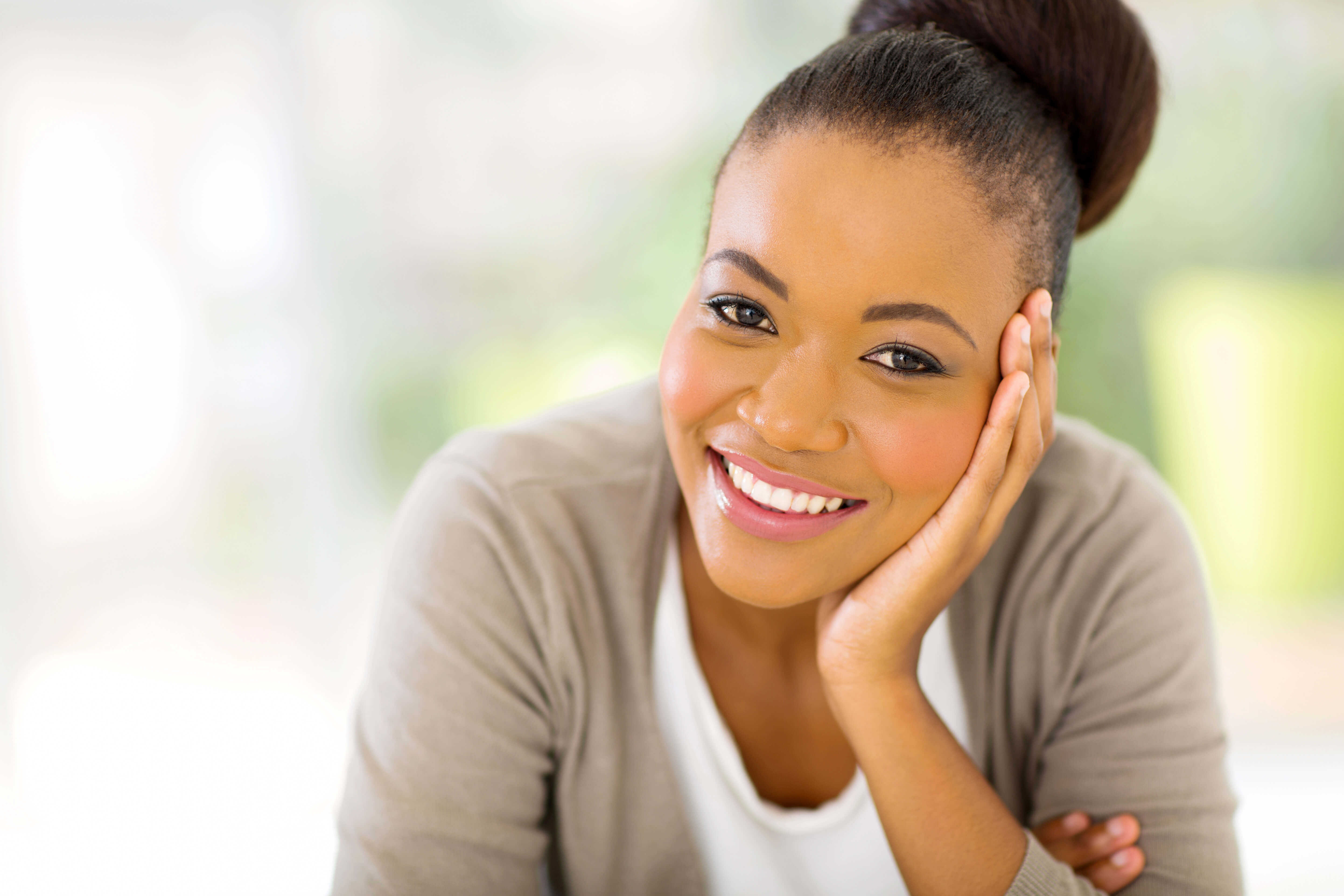 african american woman looking at the camera african american woman looking at the camera