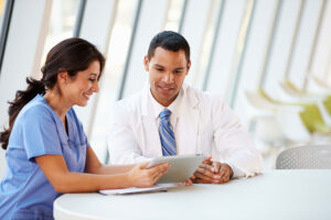 Medical professionals reviewing a treatment plan